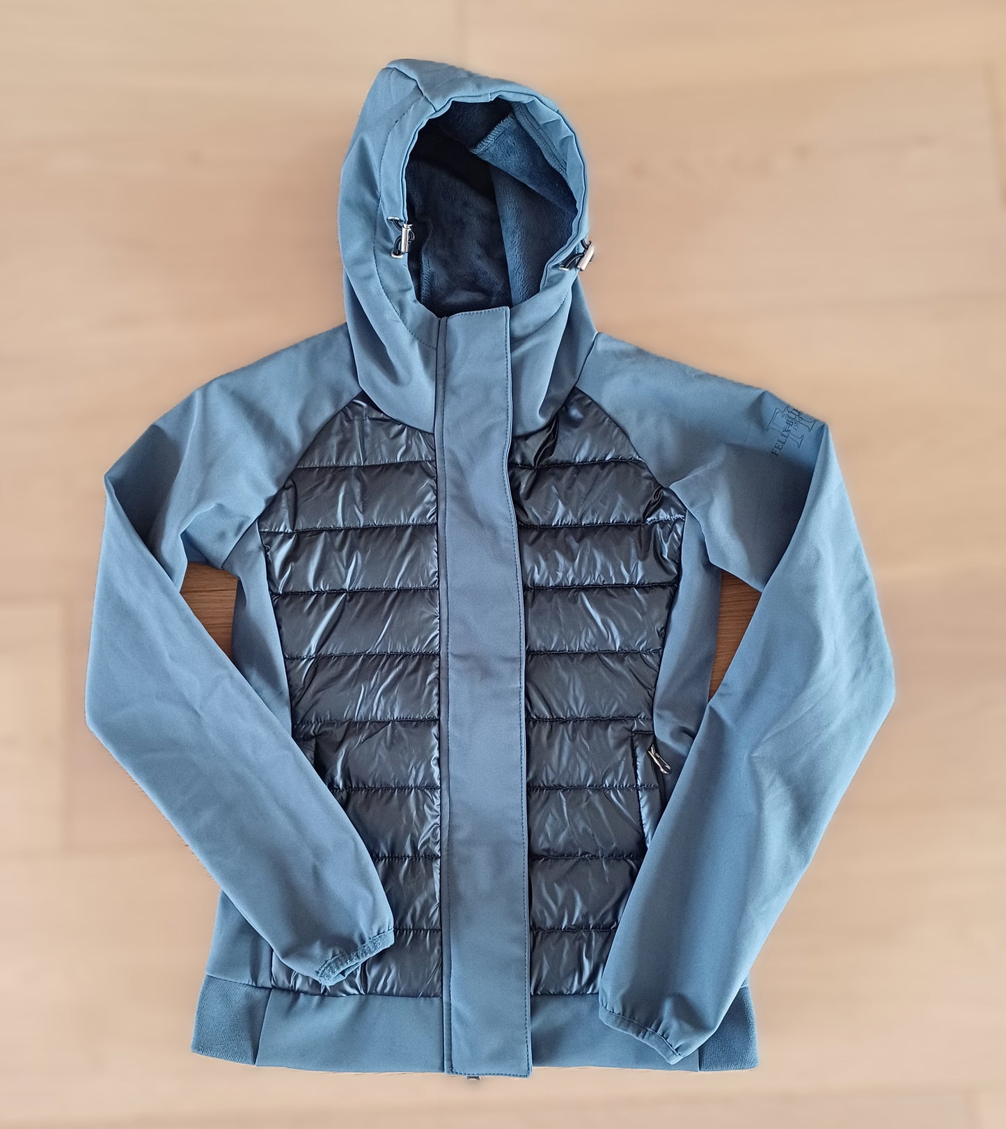 Felix Buhler lichtblauwe jas 10 jaar